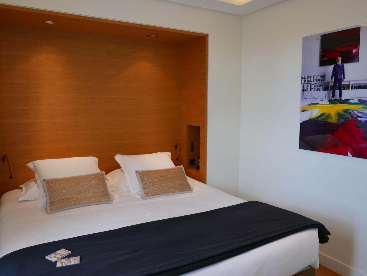 Hotel Marignan Champs-Elysees Paris Bagian luar foto