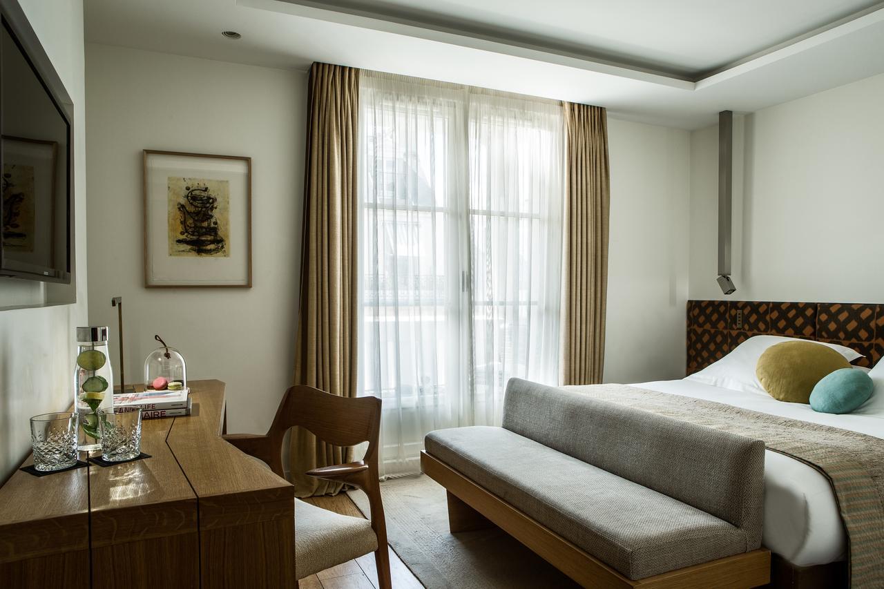 Hotel Marignan Champs-Elysees Paris Bagian luar foto