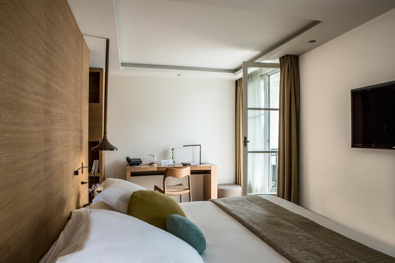 Hotel Marignan Champs-Elysees Paris Bagian luar foto